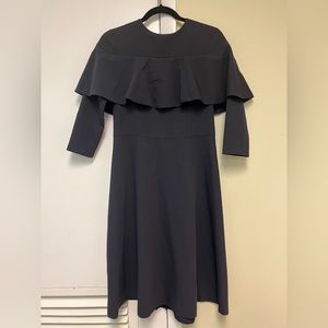 Long sleeve navy wedding dress with cape drape sleeve